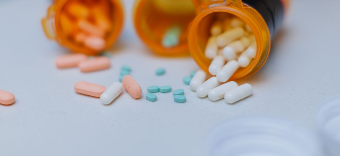 Open Pill Bottle on Kitchen Counter