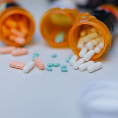 Open Pill Bottle on Kitchen Counter